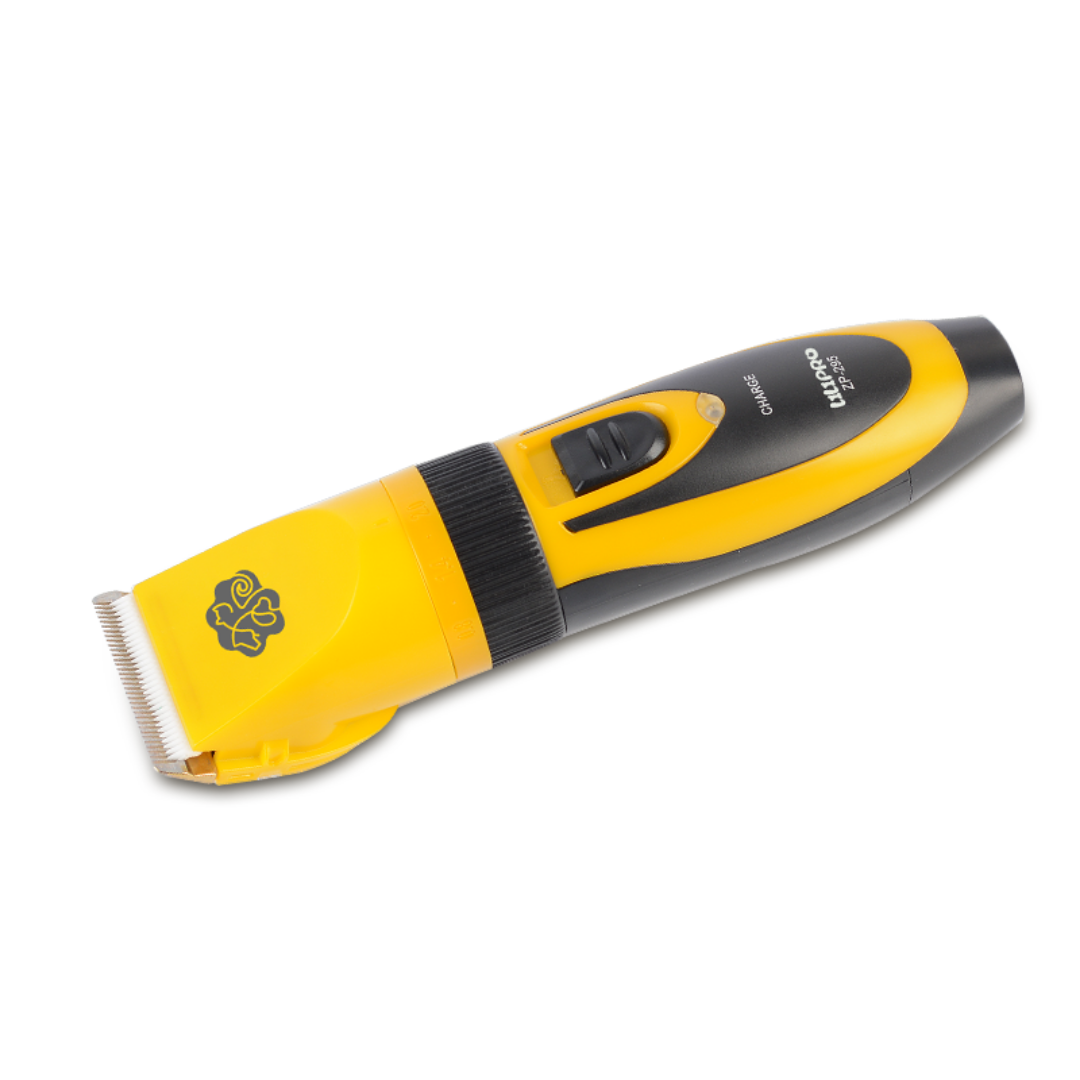 Máquina de cortar pelo ZP-295 amarilla y negra, vista lateral acostada