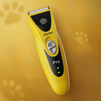 Máquina de cortar pelo PT305 amarilla sobre fondo amarillo con huellas